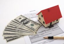 Mảnh đất mang đi thế chấp bị xử lý thì căn nhà nằm trên mảnh đất có bị xử lý theo không?